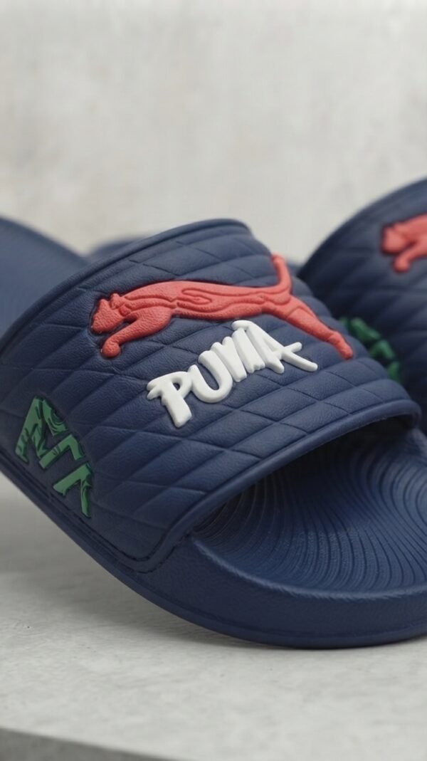 PUMA Quilted Sport Slides – Black with Bold Graphic Detail
