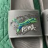 PUMA Graphic Sport Slides – Grey with Neon Accents