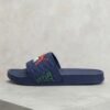 PUMA Quilted Sport Slides – Black with Bold Graphic Detail