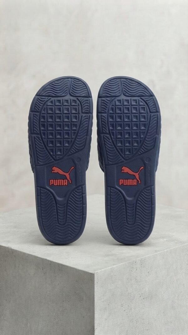 PUMA Quilted Sport Slides – Black with Bold Graphic Detail