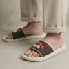 PUMA Quilted Sport Slides – Black with Bold Graphic Detail