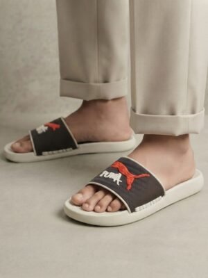 PUMA Quilted Sport Slides – Black with Bold Graphic Detail