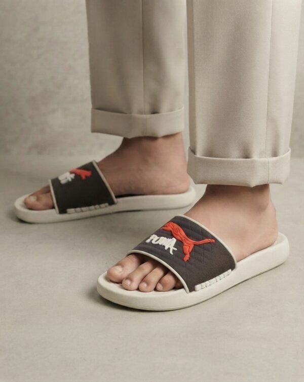 PUMA Quilted Sport Slides – Black with Bold Graphic Detail