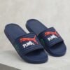 PUMA Quilted Sport Slides – Black with Bold Graphic Detail