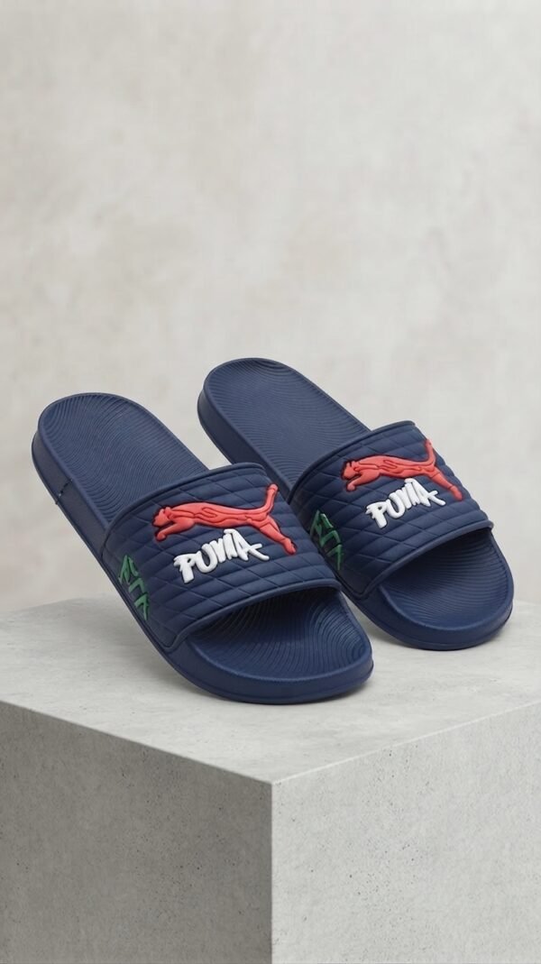 PUMA Quilted Sport Slides – Black with Bold Graphic Detail